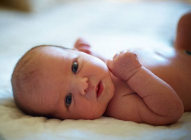 cute-3-days-newborn-baby-lying-in-bed-at-home-2022-12-16-14-51-53-utc